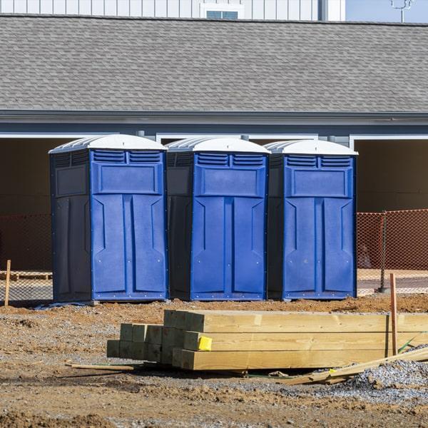Heavy-duty construction site porta potty in Berlin, New Hampshire